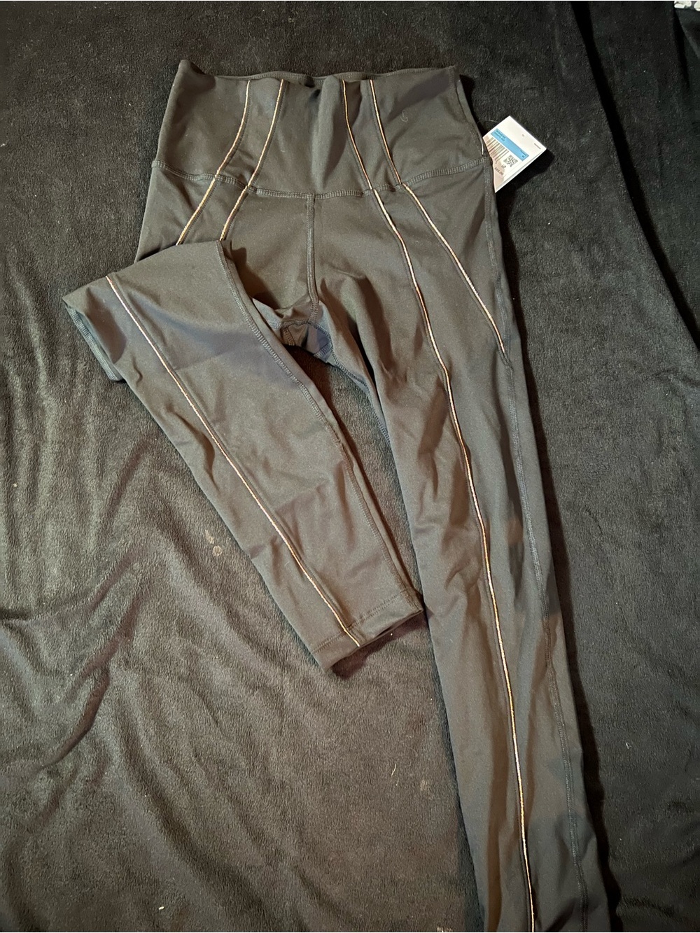 Nike Yoga Dri Fit Black Leggings with Gold Contrast Piping
